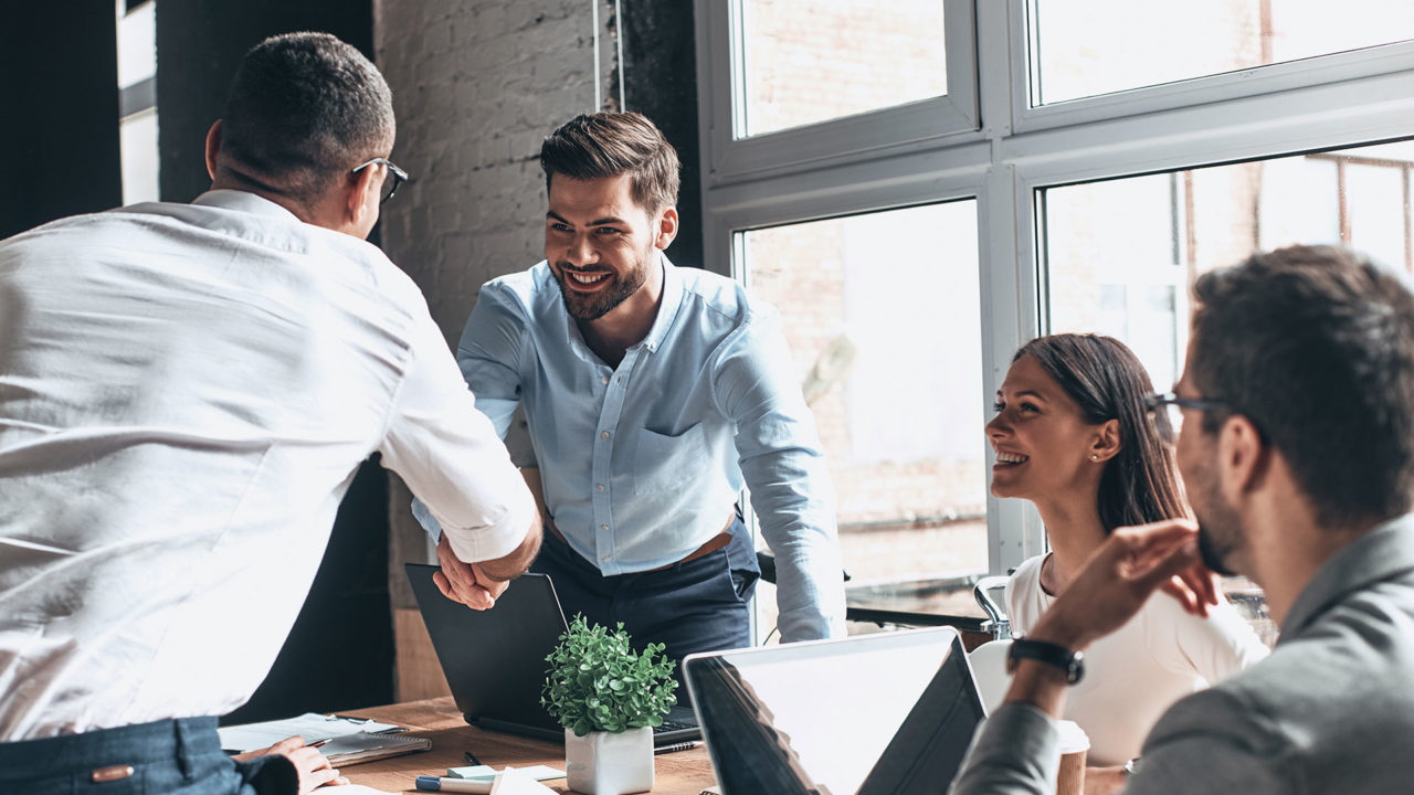 Staff Boom Wholesale Brokers Page Banner - Two Corporate Men Shaking Hands