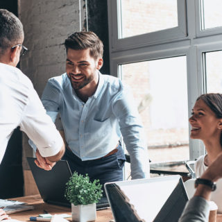 Staff Boom Wholesale Brokers Page Banner - Two Corporate Men Shaking Hands